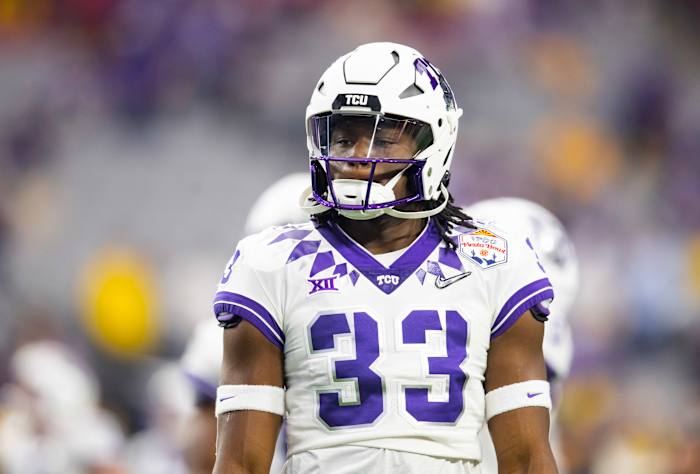 Kendre Miller (33) warms up before matchup against the Michigan Wolverines